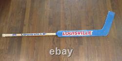 Bâton de gardien de but de hockey Louisville utilisé en jeu par Al Jensen des Washington Capitals des années 1980.