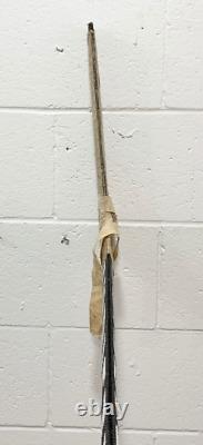 Bâton de hockey utilisé en jeu Christian du gardien de but Jon Casey des Minnesota North Stars 22910